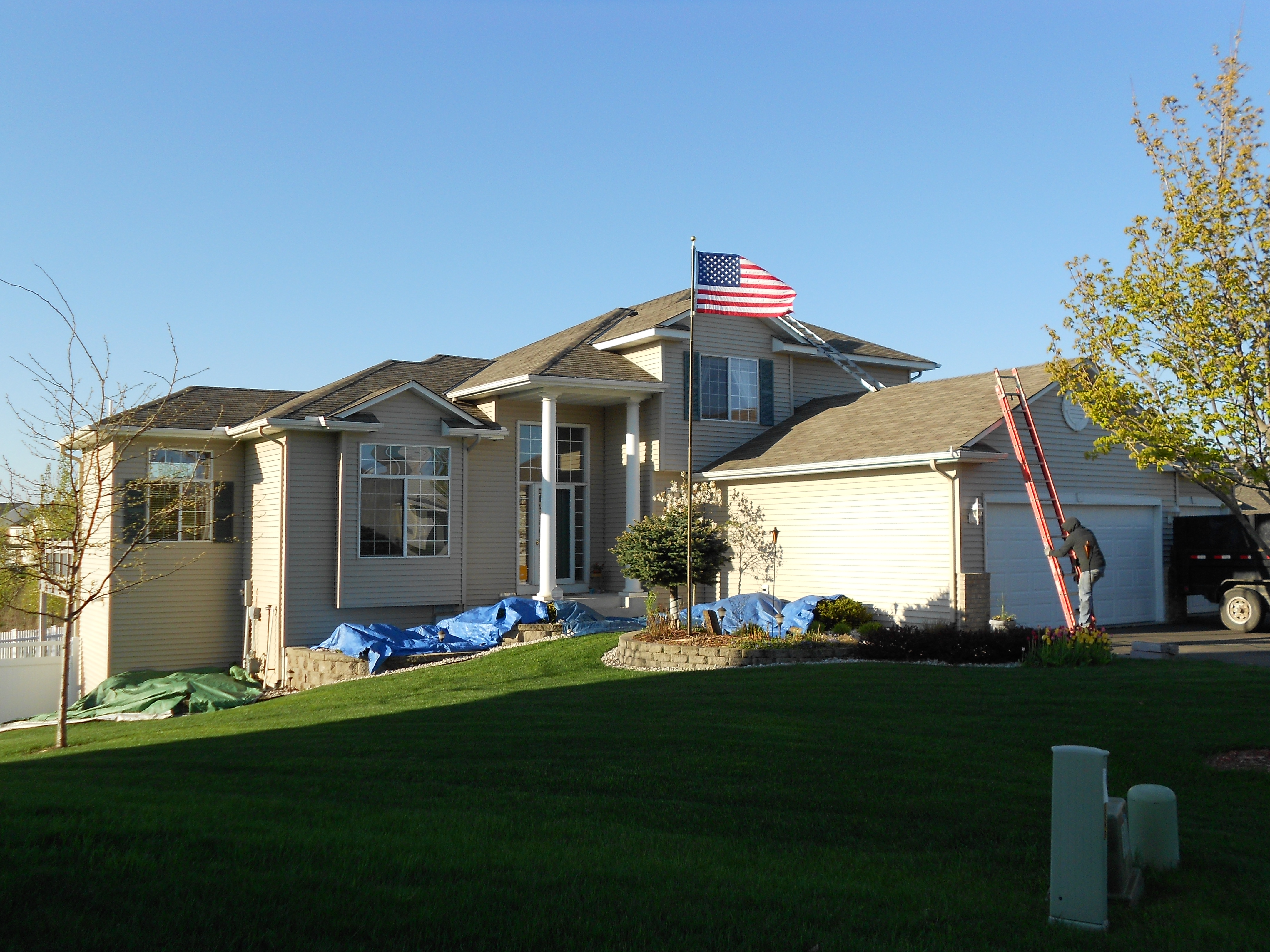 Northern Forge Construction completing asphalt shingle roof replacement on residential home in Andover, MN
